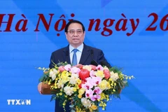 El primer ministro Pham Minh Chinh habla en la conferencia de balance del programa "Todo el país se une para eliminar viviendas precarias" (Foto: VNA)
