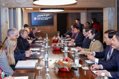 Durante la reunión entre el primer ministro de Vietnam, Pham Minh Chinh, y la presidenta de Suiza, Karin Keller-Sutter, en Davos. (Fuente: VNA)