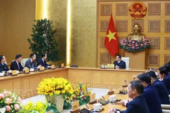 El primer ministro de Vietnam, Pham Minh Chinh, recibe a He Wei, embajador de China. (Foto: VNA)