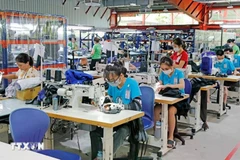 La industria de la confección contribuirá en gran parte al crecimiento económico de Vietnam. (Foto: VNA)