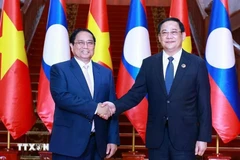 El primer ministro Pham Minh Chinh se reunió con su homólogo de Laos y presidente de la ASEAN 2024, Sonexay Siphandone, en ocasión de las cumbres de la ASEAN en Vientiane en octubre en Vientiane. (Foto: VNA)