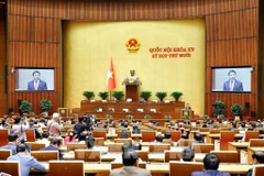 Escena de una reunión de la Asamblea Nacional de Vietnam durante su décimo período de sesiones de la XV Legislatura. (Foto: VNA)