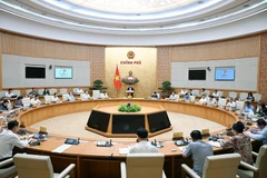 El primer ministro de Vietnam, Pham Minh Chinh, habla en la reunión. (Foto: VNA)
