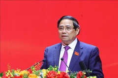 El miembro del Buró Político, secretario del Comité partidista del Gobierno y primer ministro Pham Minh Chinh, habla en la reunión. (Foto: VNA)
