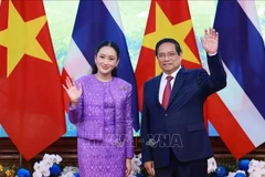 El primer ministro de Vietnam, Pham Minh Chinh, y su homóloga tailandesa, Paetongtarn Shinawatra. (Foto: VNA)