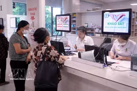 Pago de tasas hospitalarias en el Hospital General de Lam Hoa, en la provincia de Thai Binh. (Fuente: VNA)