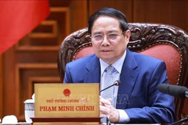 El primer ministro de Vietnam, Pham Minh Chinh, preside la reunión. (Fuente: VNA)