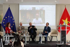 En una sesión de debate del evento (Fuente: VNA)