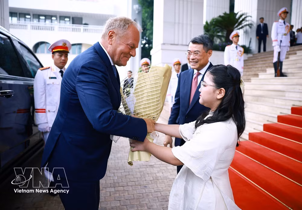 vnanet_potal-thu-tuong-le-minh-hung-chu-tri-le-don-thu-tuong-ba-lan-9111935.jpg