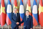 El secretario general del Partido Comunista de Vietnam (PCV), To Lam, (izquierda) y el titular de la Asamblea Nacional de Laos, Saysomphone Phomvihane (Fuente: VNA)
