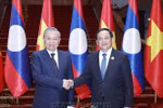 El secretario general del Partido Comunista de Vietnam, To Lam, (izquierda) y el primer ministro de Laos, Sonexay Siphandone (Fuente: VNA)