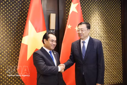 El ministro de Agricultura y Medio Ambiente de Vietnam, Trinh Viet Hung, y su par chino de Agricultura y Asuntos Rurales, Zhang Zhu. Foto: VNA