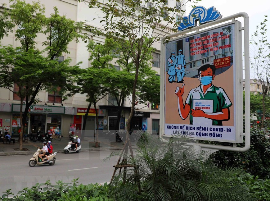 Un cartel en la calle Giang Vo (Foto: VNA)