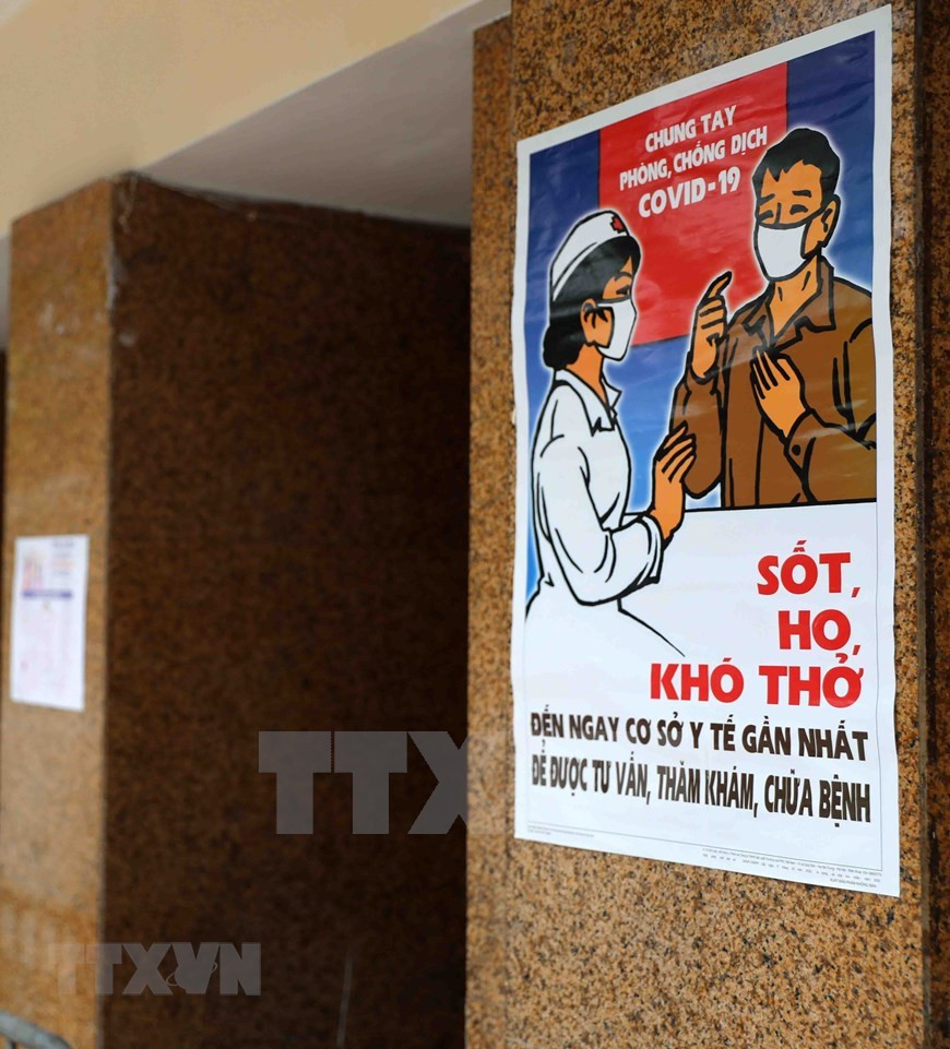 Un cartel en la entrada del mercado Dong Xuan en el casco antiguo de Hanoi (Foto: VNA)