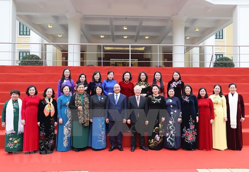 Altos dirigentes nacionales y participantes en el evento. (Foto: VNA)