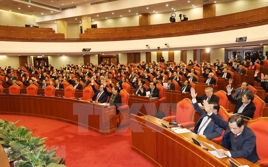 Los delegados votan para aprobar la agenda del evento. (Foto: VNA)