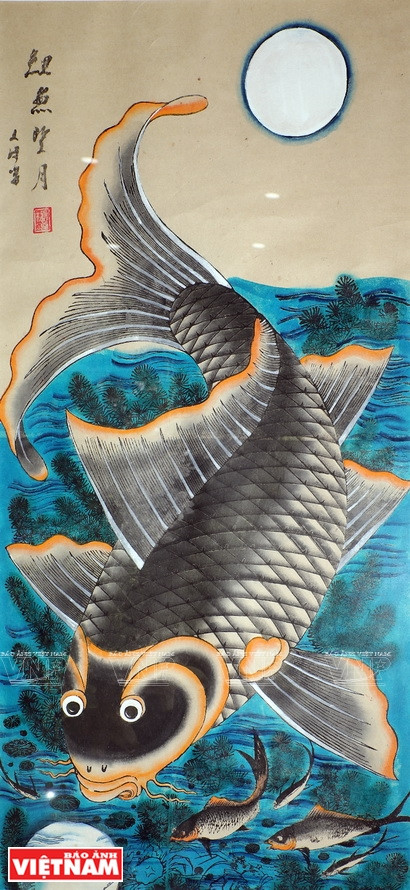La pintura "Carpas contemplan la luna", en papel. (Foto: Revista Vietnam)