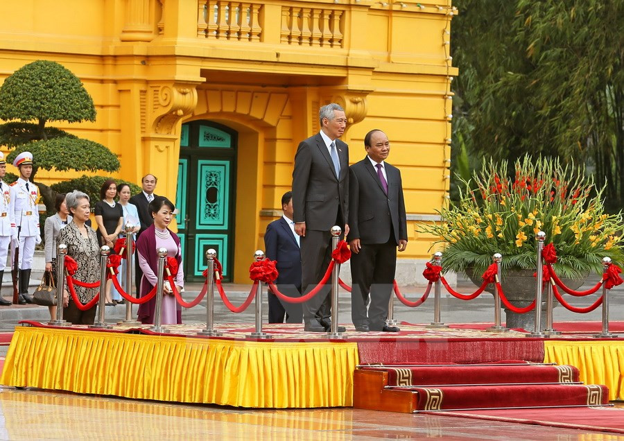 La recepción oficial al primer ministro de Singapur, Lee Hsien Loong. (Foto:VNA)