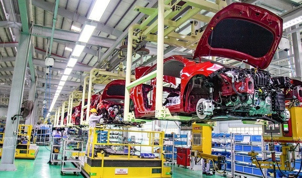 Línea de ensamblaje de coches de turismo Kia. (Foto: VNA)