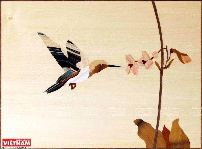 Los temas de las imágenes de marquetería de Nguyen Trung Ky son diversos, pero una gran parte de ellos trata sobre el paisaje y la gente de Vietnam (Foto: VNA)