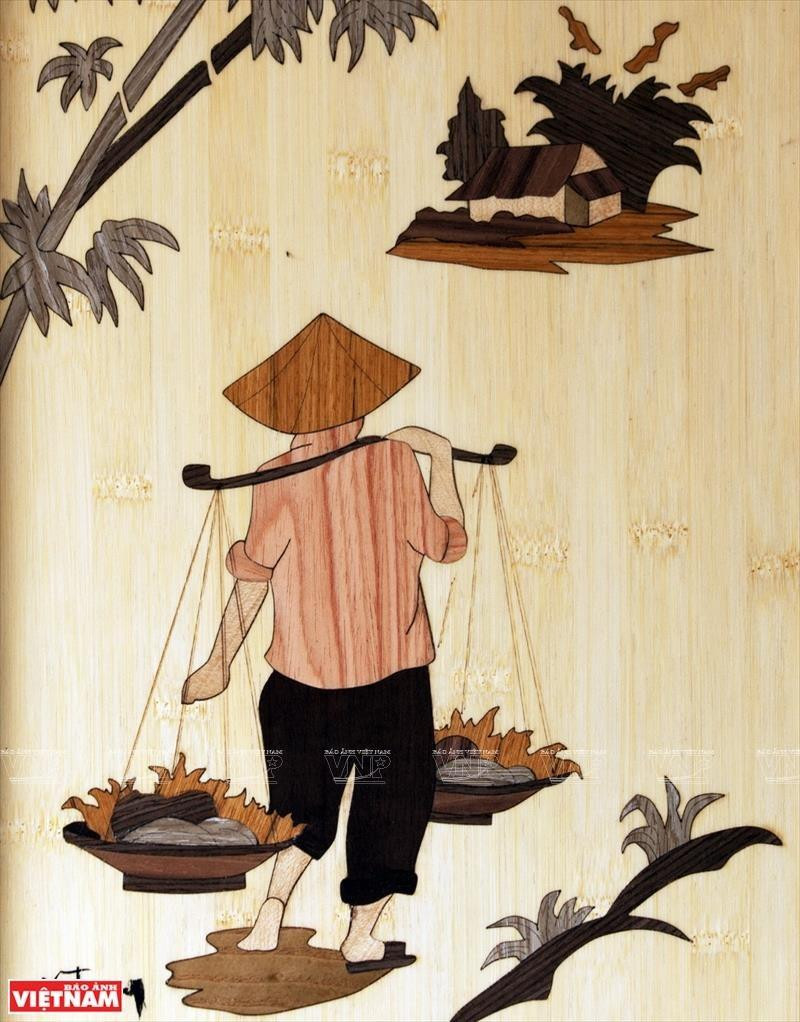 Los temas de las imágenes de marquetería de Nguyen Trung Ky son diversos, pero una gran parte de ellos trata sobre el paisaje y la gente de Vietnam (Foto: VNA)