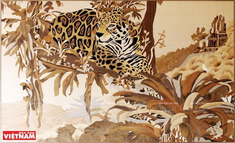Los temas de las imágenes de marquetería de Nguyen Trung Ky son diversos, pero una gran parte de ellos trata sobre el paisaje y la gente de Vietnam (Foto: VNA)