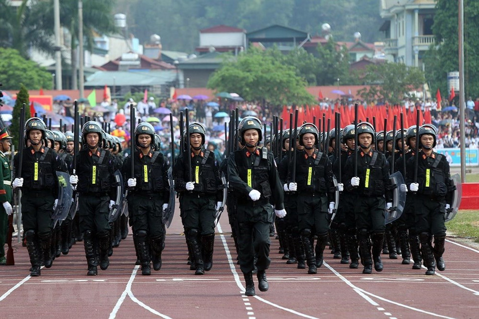 Unidad de policía móvil participan en el desfile. (Foto: VNA)
