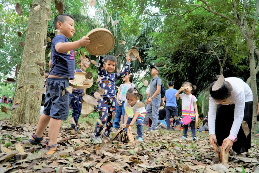 Los niños se divierten con las actividades de entretenimiento (Foto: Vietnam+)
