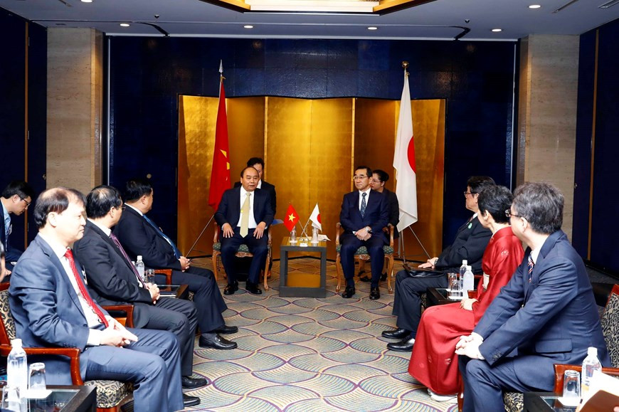 El primer ministro de Vietnam, Nguyen Xuan Phuc, recibe al presidente de la Organización de Promoción Comercial de Japón(JETRO), Nobuhiko Sasaki (Foto: VNA)