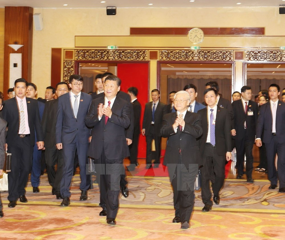 El secretario general del PCV, Nguyen Phu Trong, y el secretario general del PCCh y presidente de China, Xi Jinping (Fuente: VNA)