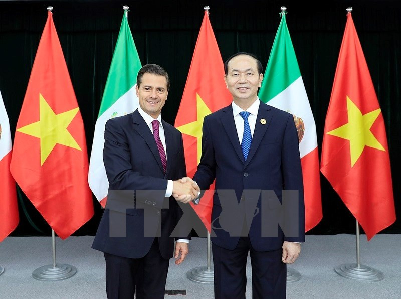 El presidente vietnamita, Tran Dai Quang, y su homólogo de México, Enrique Peña Nieto (Fuente: VNA)