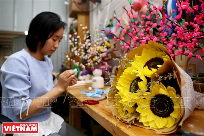 Una trabajadora de Flower Farm (Fuente: Revista Vietnam)