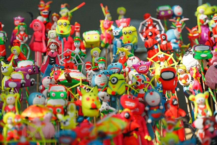 To He siempre resalta por sus diversas formas y colores según los personajes que les encanta a los niños. (Foto: VNA)