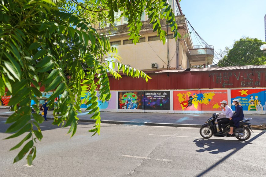 Cada imagen transmite al público un mensaje diferente sobre el combate contra el coronavirus (Foto: VNA)