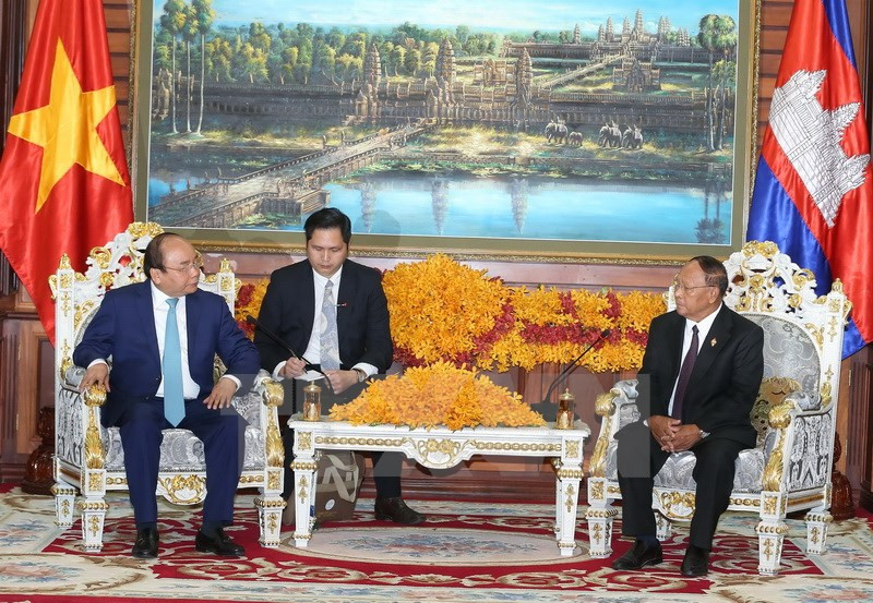 El primer ministro de Vietnam, Nguyen Xuan Phuc, y el presidente de la Asamblea Nacional de Camboya, Samdech Heng Samrin (Fuente:VNA)
