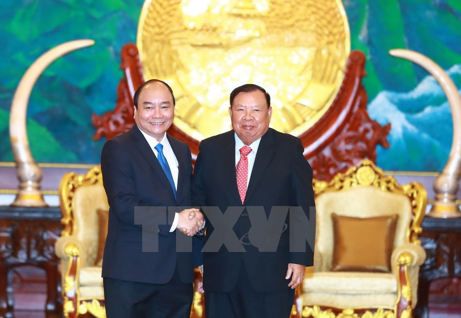El premier vietnamita, Nguyen Xuan Phuc, y el presidente laosiano, Bounnhang Vorachith (Fuente: VNA)