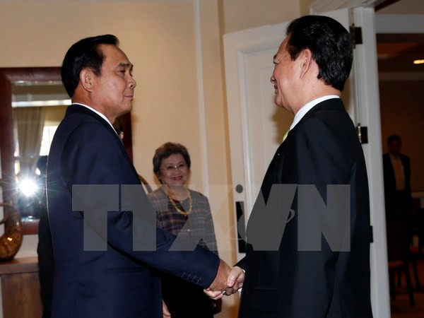 Tan Dung y su homólogo tailandés, Prayuth Chan-ocha (Fuente: VNA)