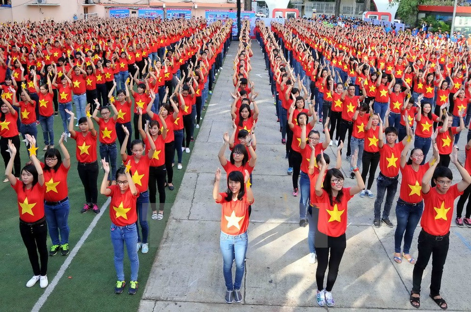 Actuación simultánea “Bienvenido a nuestro país, nuestro pueblo” (Fuente: VNA)