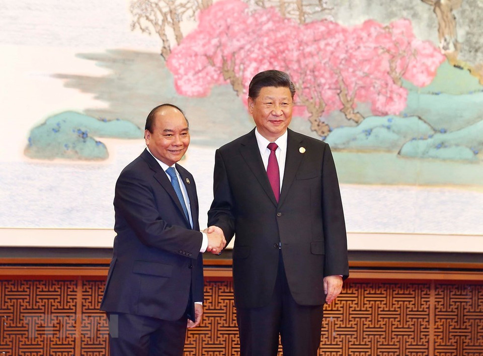 El primer ministro de Vietnam, Nguyen Xuan Phuc, fue recibido por el secretario general del Partido Comunista y presidente de China, Xi Jinping (Fuente: VNA)