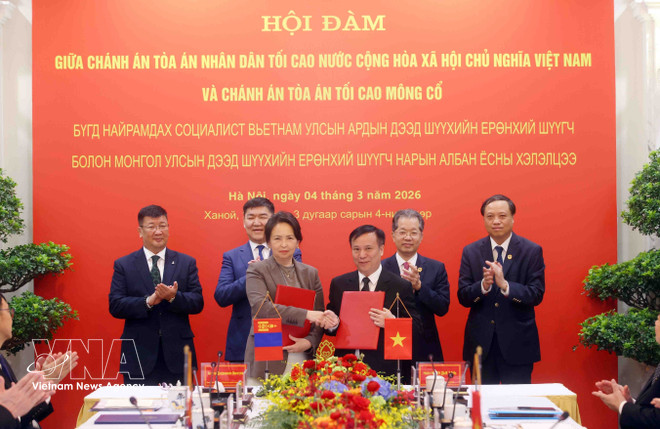 vnanet-potal-chanh-an-toa-an-nhan-dan-toi-cao-hoi-dam-voi-chanh-an-toa-an-toi-cao-mong-co-8620138.jpg