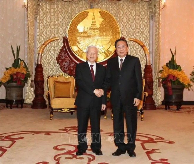 El secretario general del PCV, Nguyen Phu Trong, y el secretario general del Partido Popular Revolucionario y presidente de Laos, Choummaly Sayasone, durante su visita a Laos en 2019. (Foto: VNA) tong-bi-thu-nguyen-phu-trong-nguyen-tong-bi-thu-chu-tich-nuoc-lao-choummaly-sayasone-2019-4622.jpg.webp
