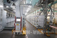 La fábrica de hilos de la empresa Unitex Textile and Dyeing aplica nueva tecnología para optimizar las operaciones mediante un modelo automatizado. Foto: VNA