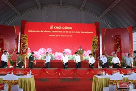 El secretario general del Partido Comunista de Vietnam, To Lam, y delegados en evento. (Fuente: VNA)