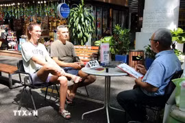Turistas extranjeros en Ciudad Ho Chi Minh. (Fuente: VNA)