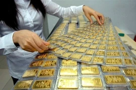 Las empresas y los bancos ya están listos para escribir un nuevo capítulo del mercado del oro. (Fuente: VietnamPlus)