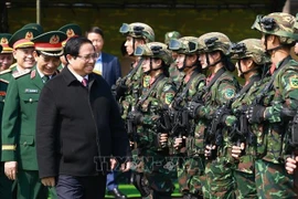 El primer ministro vietnamita, Pham Minh Chinh, visita la Brigada K3. (Fuente: VNA)