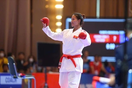Dinh Thi Huong defendió con éxito su título en los -68 kg femeninos al vencer a una rival indonesia por 8-5. (Foto: tdtt.gov.vn)