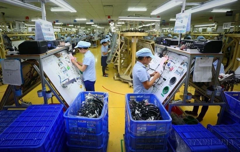 Fabricación de componentes electrónicos. (Foto: VNA)