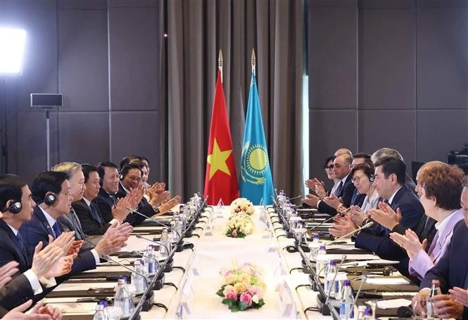 Durante la reunión entre To Lam y Yerlan Koshanov. (Foto: VNA)
