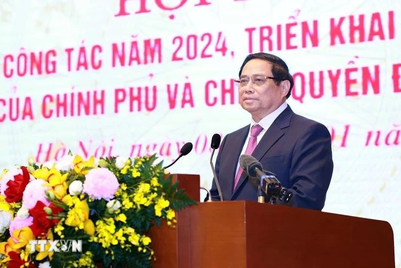 El primer ministro Pham Minh Chinh afirma el compromiso de cumplir con todas las tareas en 2025. (Fuente: VNA) 